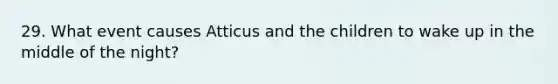29. What event causes Atticus and the children to wake up in the middle of the night?
