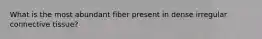 What is the most abundant fiber present in dense irregular connective tissue?