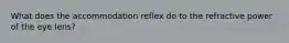 What does the accommodation reflex do to the refractive power of the eye lens?