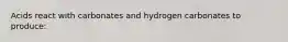 Acids react with carbonates and hydrogen carbonates to produce: