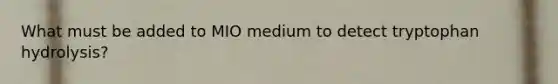 What must be added to MIO medium to detect tryptophan hydrolysis?