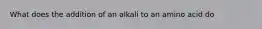 What does the addition of an alkali to an amino acid do