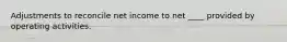 Adjustments to reconcile net income to net ____ provided by operating activities.