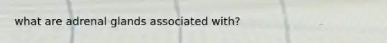 what are adrenal glands associated with?