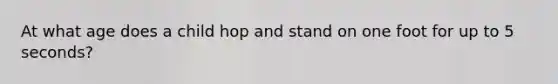 At what age does a child hop and stand on one foot for up to 5 seconds?