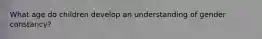 What age do children develop an understanding of gender constancy?