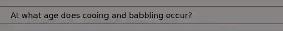 At what age does cooing and babbling occur?