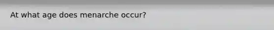 At what age does menarche occur?