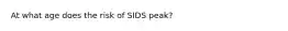 At what age does the risk of SIDS peak?