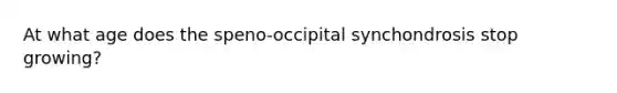 At what age does the speno-occipital synchondrosis stop growing?