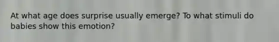 At what age does surprise usually emerge? To what stimuli do babies show this emotion?