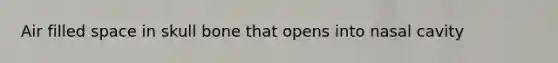Air filled space in skull bone that opens into nasal cavity