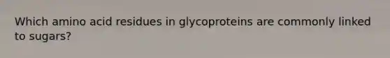 Which amino acid residues in glycoproteins are commonly linked to sugars?