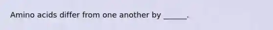 Amino acids differ from one another by ______.