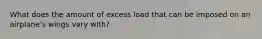 What does the amount of excess load that can be imposed on an airplane's wings vary with?