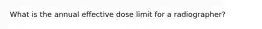 What is the annual effective dose limit for a radiographer?