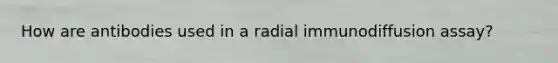 How are antibodies used in a radial immunodiffusion assay?