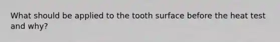 What should be applied to the tooth surface before the heat test and why?