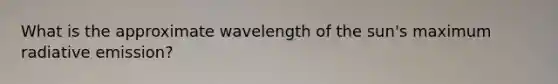 What is the approximate wavelength of the sun's maximum radiative emission?