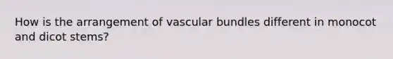 How is the arrangement of vascular bundles different in monocot and dicot stems?