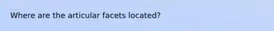 Where are the articular facets located?