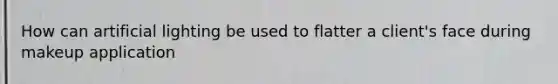 How can artificial lighting be used to flatter a client's face during makeup application