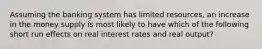 Assuming the banking system has limited resources, an increase in the money supply is most likely to have which of the following short run effects on real interest rates and real output?