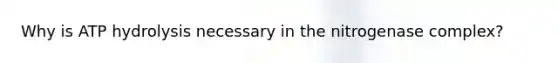 Why is ATP hydrolysis necessary in the nitrogenase complex?