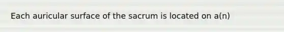 Each auricular surface of the sacrum is located on a(n)