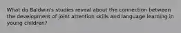What do Baldwin's studies reveal about the connection between the development of joint attention skills and language learning in young children?