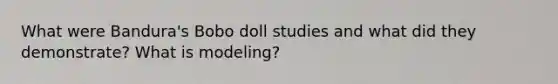 What were Bandura's Bobo doll studies and what did they demonstrate? What is modeling?