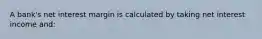 A bank's net interest margin is calculated by taking net interest income and: