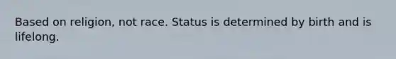 Based on religion, not race. Status is determined by birth and is lifelong.