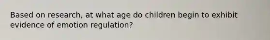 Based on research, at what age do children begin to exhibit evidence of emotion regulation?