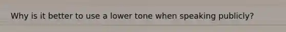 Why is it better to use a lower tone when speaking publicly?