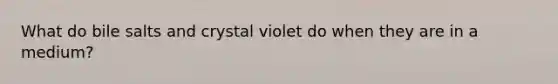 What do bile salts and crystal violet do when they are in a medium?