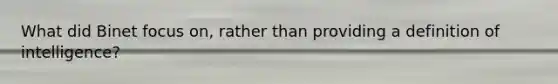 What did Binet focus on, rather than providing a definition of intelligence?