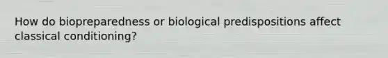 How do biopreparedness or biological predispositions affect classical conditioning?