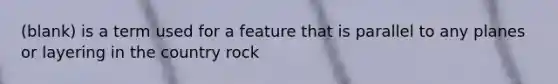 (blank) is a term used for a feature that is parallel to any planes or layering in the country rock