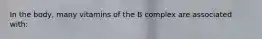 In the body, many vitamins of the B complex are associated with: