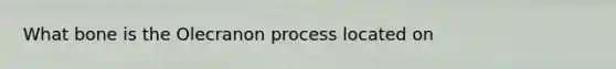 What bone is the Olecranon process located on