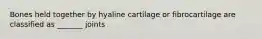 Bones held together by hyaline cartilage or fibrocartilage are classified as _______ joints