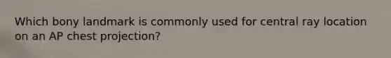 Which bony landmark is commonly used for central ray location on an AP chest projection?