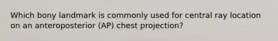 Which bony landmark is commonly used for central ray location on an anteroposterior (AP) chest projection?