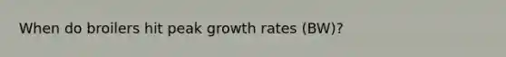 When do broilers hit peak growth rates (BW)?