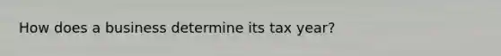 How does a business determine its tax year?