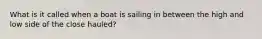 What is it called when a boat is sailing in between the high and low side of the close hauled?