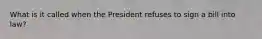 What is it called when the President refuses to sign a bill into law?