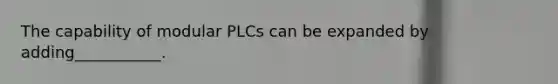 The capability of modular PLCs can be expanded by adding___________.