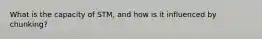 What is the capacity of STM, and how is it influenced by chunking?